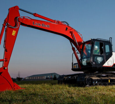 Link-Belt 160 excavator at an urban construction site, illustrating how to choose the right excavator for large projects.
