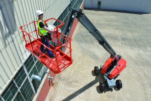66ft Telescopic / Straight Boom Lift providing high-reach access for exterior building inspection and maintenance work.