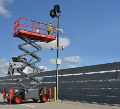 Scissor lift raised to working height showing how high scissor lifts can go.